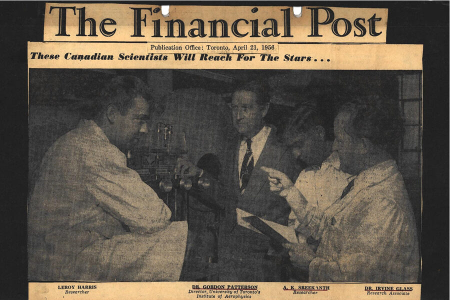 Newspaper clipping from The Financial Post, April 21, 1956
Headline: Canada’s Moon-Men Chart Venture Into Outer Space
Byline: Stanton Edwards
Photo: Four scientists in discussion before large lab equipment.
Caption: These Canadian Scientists Will Reach For The Stars… (Leroy Harris, Researcher; Dr. Gordon Patterson, Director, University of Toronto’s Institute of Aerophysics; A.K. Sreekanth, Researcher; Dr. Irvine Glass, Research Associate)
Research into vital aspects of space flight conditions has gone farther than anywhere else in the world in a dumpy, barn-like building on the outskirts of Toronto. There’s no one named Buck Rogers at Canada’s “Space College,” but there’s a “Rocky” Martino and a Norman Tucker and an Irvine Glass and a score of other Canadians literally reaching for the stars. And there’s the Boss himself, six-foot mathematical wizard Dr. Gordon Patterson, a robust rocketeer, who took off his white lab coat and did the sales-promotion job making it all possible. Here are some of the questions they are trying to answer:
-	What happens to metals at 20,000 mph?
-	What can combat the “heat barrier”?
-	What strains will wrench at a speeding satellite?
-	What is the effect of shock’s static electricity?
-	What does the inside of a shock wave look like?
-	What is the “slip” of a satellite leaving gravity?
-	What will stop a satellite from losing itself in space?
The swelling thunder of rocket engines will shock the earth’s warm atmosphere in July, 1957, when man’s first satellite streaks upward to its orbit in space. Humming radar, telescopic cameras and a few thousand hopeful eyes will follow its flight, but nowhere will anxious tension mount higher than in a drab building on a back street at Toronto’s Downsview Airport. There, amid scrawled equations and shock tubes and wind tunnels, an elite team of two dozen young Canadians has been doing much of the research groundwork for the man-made moons.
Even now – scarcely a year before the first satellite is scheduled to blast off – the robust six-foot scientist who runs Canada’s “space college” can assert confidently: “Research here has gone further than at any other research establishment in the world that is studying flight conditions in outer space.” Dr. Gordon Patterson, director of the University of Toronto’s Institute of Aerophysics, mathematical wizard, administrator, educator, space pioneer, can afford to be confident. The strapping 48-year-old aerodynamicist, whose acquaintances claim he will need an outsized suit when interplanetary flights begin, has gather at the Institute a hand-picked team of keen brains, most of them Ph.D. students. As a team, they are creating in the tunnels and tubes that snake through the Institute’s laboratories the exact conditions of outer space where the manufactured moons are destined. 
Behind these ultramodern intricacies, however, lies a feat of old-fashioned salesmanship that would win plaudits in any company board room. With a welcome grant from the Defense Research Board the Institute was founded in 1949, and it moved into the former RCAF building it still calls home today. Dr. Patterson doffed his white lab coat and slipped into his business suit. He sold DRB on the great opportunities for advanced study with the Institute’s specialized equipment – particularly in the field of high altitude research.
So, when the United States Air Force confronted the Defense Research Board with problems in high altitude research, the Board told the Institute, “Go ahead, find the answers.” In 1951, the Institute undertook the research program, back financially by DRB. “Most people are finding it pretty hard to believe that the first satellite will be in the sky by 1957,” says Dr. Patterson today. Crediting other Canadians with the work that is being done on guided missiles he remarks: “Building the satellite is one thing, but getting it sufficiently powered to reach its destination is a job that is being done in part right here in Canada at Valcartier.”
Information about the upper atmosphere that the early satellites will record, say Director Patterson, will be used along with other information acquired in the U.S. and Canada to investigate space travel for humans. “Data from our research at the Institute will play a direct part in designing satellites which must in turn provide us with further information before we can don the space suit,” he says.
High altitude research was not a new pattern of study to Dr. Patterson when the program began at the Institute. He had done postgraduate work in fluid mechanics – the study of flows in gases – at the university from 1932 until 1935. After a circuitous route around the world in which he worked first as a Scientific Officer at Farnborough, England, and later took command of an aerodynamics laboratory in Australia, the amiable Dr. Patterson studied jet propulsion and supersonics in California. He then returned to teach in the department of Aeronautical Engineering at Toronto. Director Patterson wasted no time in assembling his students after the satellite project was made public last July in Washington. The young scientists, always enthusiastic, exerted themselves even more after an Institute round table on space travel. “Sometimes these fellows worked nearly 24 hours at a stretch,” he recalls. And work they mush for the obstacles to success of the satellite launchings rest in part on their shoulders.
Many problems face the moon-makers. If the satellites do not go far enough in flight, they will fall back to the earth. They must become free enough of gravity to reach their final orbit, about 300 miles from the earth’s surface. If the satellite launchings are a success, then the spheres will circle the world several times a day. At certain times they will be visible to the naked eye of viewers. But exactly when and where remains speculation. If, however, the man-made spheres go too far, they will slip into outer space and be forever lost. It is essential then that the exact data be supplied as an integral part of launching instructions. The Institute has been providing such information. 
There are other innate problems in launching the moons, too. For instance, in the first flights through the sound barrier pilots like Geoffrey de Havilland were killed as their aircraft became uncontrollable. It is known now that entirely different principles of flight affect the surface of the aircraft’s wings in crashing the sound barrier. “Scientists overcame the sound barrier step by step until today it presents no problem,” says Dr. Patterson. “Delta-wing aircraft are specially designed for flights through the sonic barrier. One of our students, Len Fowell, worked out the first complete theory of what happens in a delta-wing (bat-shaped) aircraft in the world.”
Now students at the Institute are moving closer to solving many of the problems that have been baffling scientists and pilots since the sound barrier was crashed and man has proceed to greater speeds and greater heights. “Once through the sonic barrier,” says Dr. Patterson, “the next obstacle is heat. Until heat can be overcome the satellite cannot be successful.” There is no doubt, he emphasizes, that the satellite would burn up in seconds in temperatures of thousands of degrees that result from the tremendous speed through the atmosphere. “A speed of over five miles per second is needed to free the satellite of the earth’s pull. Since that speed is essential, the heat problem is unavoidable,” he adds, glancing toward one of the maze of equations on his office blackboard.
What exactly will happen to an object moving through space at a height of 120,000 feet traveling nearly 20,000 mph – conditions under which the ten satellites scheduled for the International Geophysical Year must travel to be successful? Some answers lie in the shock tubes at the Institute where shock experiments are in charge of Dr. Irvine I. glass, who is Director Patterson’s research associate. “We know that there is an electrostatic charge produced on the surface of an object traveling at these phenomenal speeds at great heights,” says Dr. Glass. The shock waves in the tube produce conditions unparalleled in the universe, according to Dr. Glass, who views his experiments as holding many secrets that must be unlocked.
One of the students at the Institute who is about to turn the key on hidden facts is Leroy Harris, who is working on the design of an instrument that will actually see inside the shock wave for the first time. This is Harris’ project for his Ph.D. and he is just getting it started. The reactions in the shock tube, Dr. Glass explains, take place when air of high density at one end meets air of low density at the other by the breaking of a diaphragm. A shock wave rushes down the tube in the same way that ripples spread in water when a stone is tossed into it. However, the shock waves at the Institute rush with such tremendous speed that they generate static electricity on the surface of models in the tubes. Scientists believe that the power in the shock wave may eventually result in “shock-ignition” engines, far more powerful than today’s piston-powered engines, predicts Dr. Glass.
Across the hall from the shock tube laboratories is a wind tunnel that can produce a lower density than any like tunnel in the world, according to Dr. Patterson. Dr. Patterson gives Norman B. Tucker, who recently received his Ph.D. much credit for the preliminary work on a “hypersonic” tunnel that had to be done before the latest tunnel could be designed.
Rocky Martino, a heavy-set youth of 26, has carried even further the work by Tucker. Student Martino, now graduated, has written a thesis on the “slip” that an object such as the satellite will have as it leaves the force of gravity on the trip through the heavens. “His theory will be accepted by scientists the world over for a long time to come as a guide to certain aspects of high-altitude flight,” comments Dr. Patterson. Problems that Martino worked out for his these could have taken months, maybe years to solve, but an electronic computer produced the answers in a matter of hours. The “Ferut” computer is fed coded information that looks like brokers’ ticker-tape. The computer can add, subtract, multiply and divide, although all operations are considered as an addition. Even the decoding takes many days, often weeks. “For many hundreds of years,” reasons Dr. Patterson, “scientists have known what lies far beyond this earth, but not until recently did we know very much about what lies close to this world. And with the facts that are being established, it appears it will take us quite a while to get all the answers.” The satellites are not a new idea to science, he explains, but the building of them was not practical until the terrific speeds necessary for their launching were developed. “Now this hurdle has been breached,” he says with a smile, “the satellites have only to survive their journey.”
What will the new moons look like? That won’t be fully determined until research at the Institute and other scientific centres is completed and assessed. The design in general – that of a larger than average basketball – will be affected to some measure by the types and size of instruments that the satellites will carry. On the basis of information supplied by principals of “Operation Vanguard,” as the project is called, there appear to be numerous protrusions from the sphere’s surface. Carrying the most advanced science equipment of man’s genius, the man-moons will perform diverse duties from space orbits. 
A cargo, not of humans at this stage, but such devices as proton precision magnetometers, telemetering transmitters, ultraviolet ray counters, magnetic aspect tubes, and radio command receivers to mention a few, will be hoisted in the project, one of the man phases of International Geophysical Year. IGY begins July, 1957, co-incidental with the launching of the first satellite. In the year’s program are many astounding events destined to give mankind a better picture of the world in which it lives and the world beyond. And tongue-defying as the names of the satellite’s cargo may sound, in simpler terms they spell the beginning of space travel for humans. They are the “vanguard” of ultimate manned space stations – the first from earth to outer space.